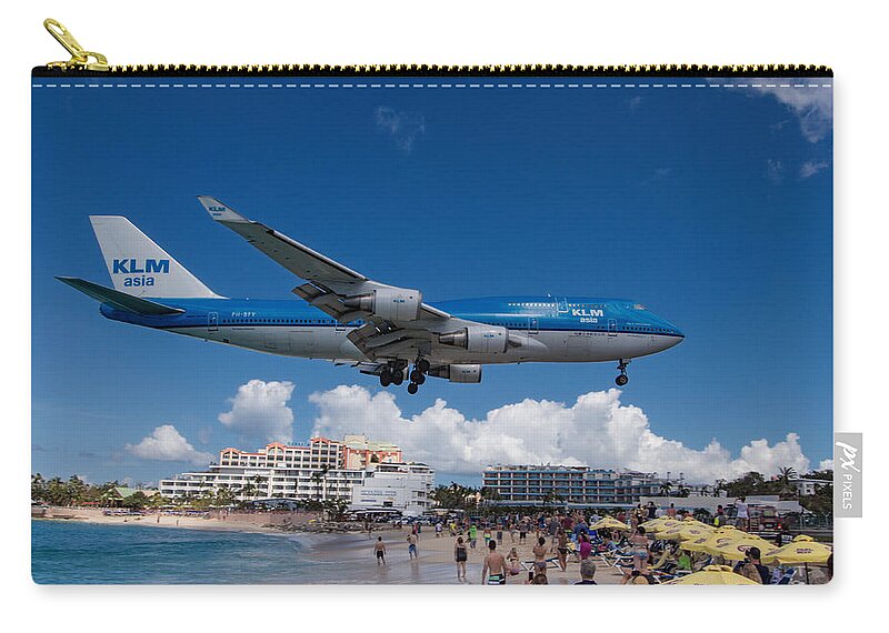 Klm Zip Pouch featuring the photograph K L M landing at St. Maarten #3 by David Gleeson