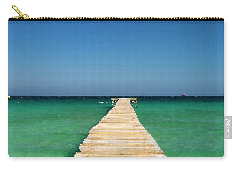 Scenics Zip Pouch featuring the photograph Landing Jetty Over Clear Seas #1 by Travelpix Ltd