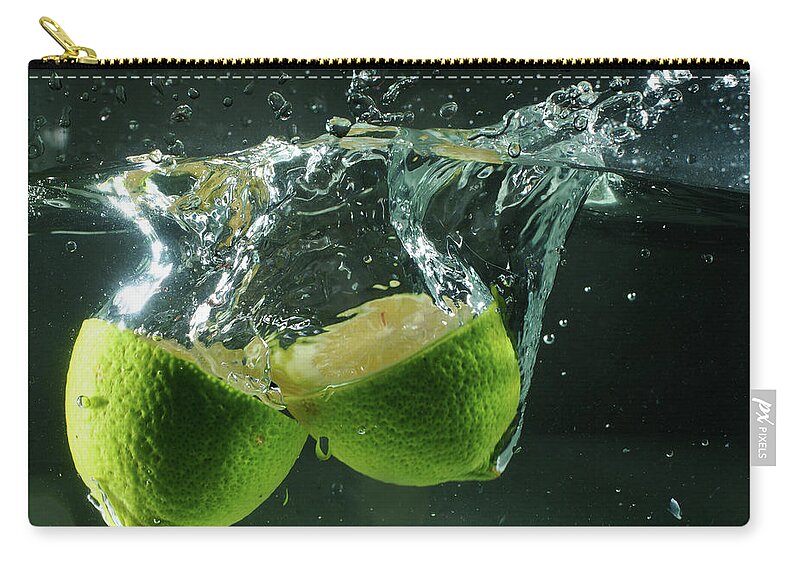 Taiwan Zip Pouch featuring the photograph Lemon Splash #1 by Copyright By Patricklee