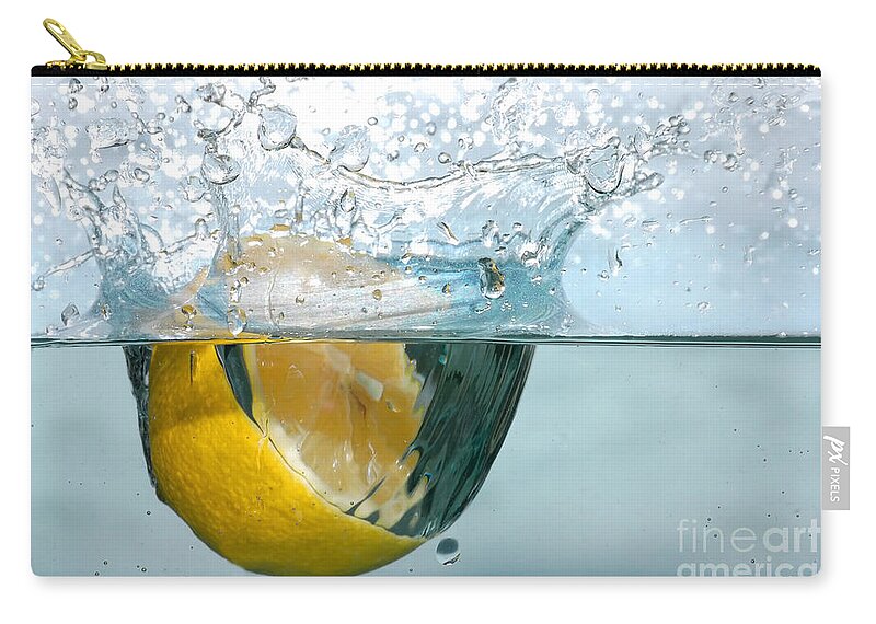 Aqua Zip Pouch featuring the photograph Lemon splash into water #1 by Michal Bednarek