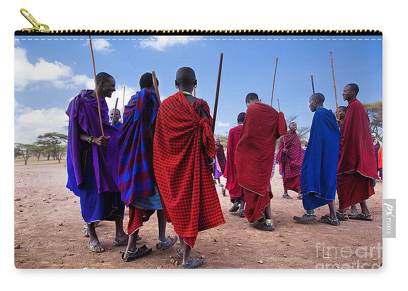 Village Zip Pouch featuring the photograph Maasai men in their ritual dance in their village in Tanzania #1 by Michal Bednarek