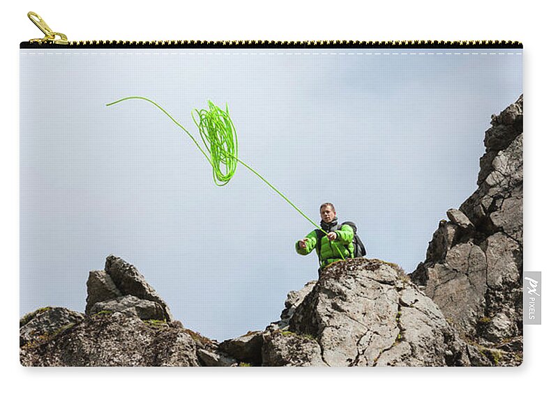 https://render.fineartamerica.com/images/rendered/default/flat/pouch/images-medium-5/1-man-throwing-a-rope-to-rappel-gumundur-tmasson.jpg?&targetx=0&targety=-345&imagewidth=777&imageheight=1165&modelwidth=777&modelheight=474&backgroundcolor=C9D6E3&orientation=0&producttype=pouch-regularbottom-medium