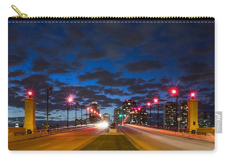 Clouds Zip Pouch featuring the photograph Night Lights #1 by Debra and Dave Vanderlaan