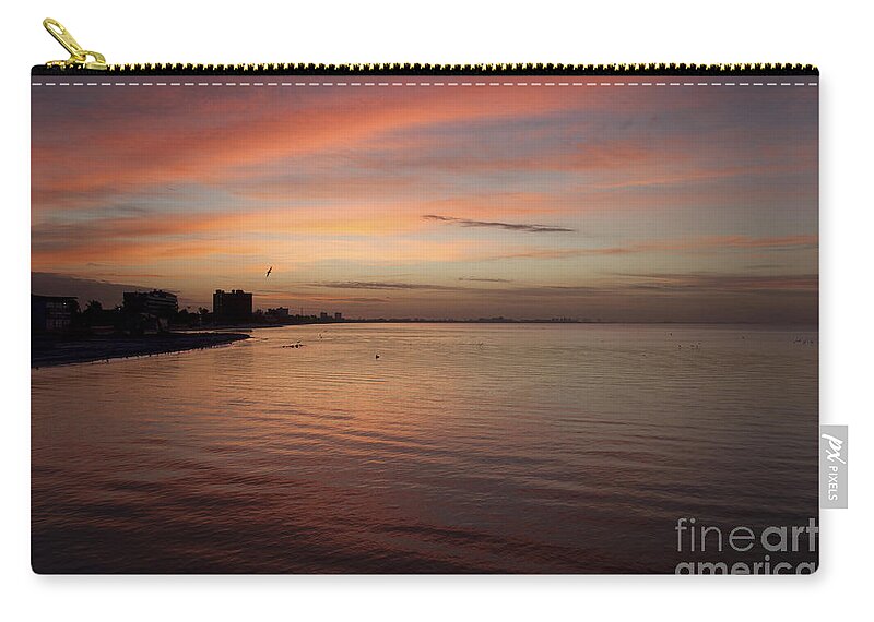 Sunrise Zip Pouch featuring the photograph Sunrise over Fort Myers Beach Photo by Meg Rousher