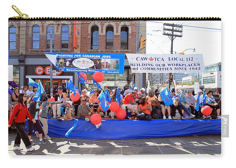 Labor Zip Pouch featuring the photograph Toronto Labor Day Parade #1 by Valentino Visentini