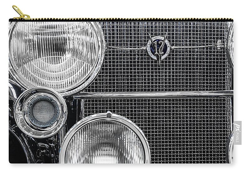 1935 Zip Pouch featuring the photograph 1935 Cadillac V12 Roadster Emblem and Headlights 1 by Ron Pate