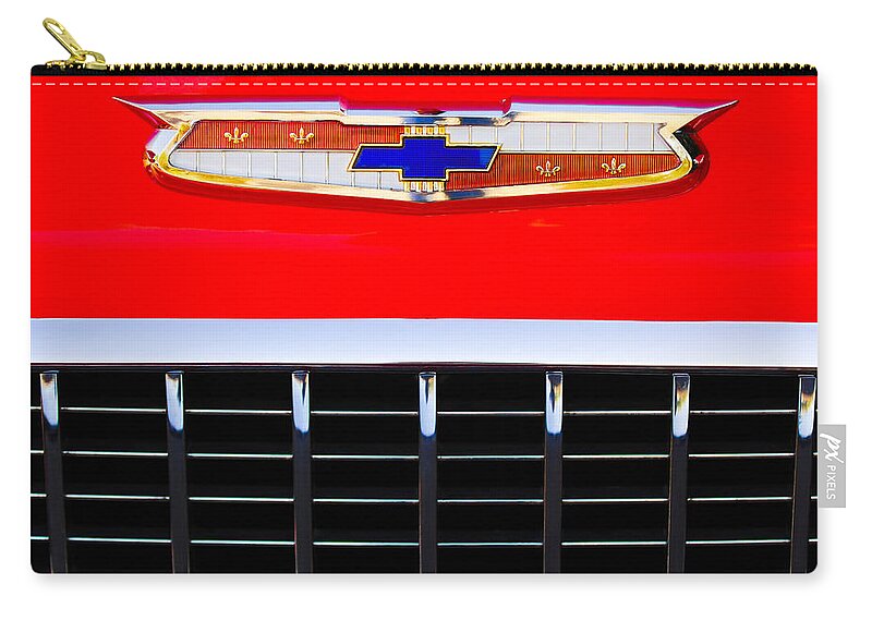 1955 Chevrolet Nomad Zip Pouch featuring the photograph 1955 Chevrolet Nomad Emblem by Jill Reger