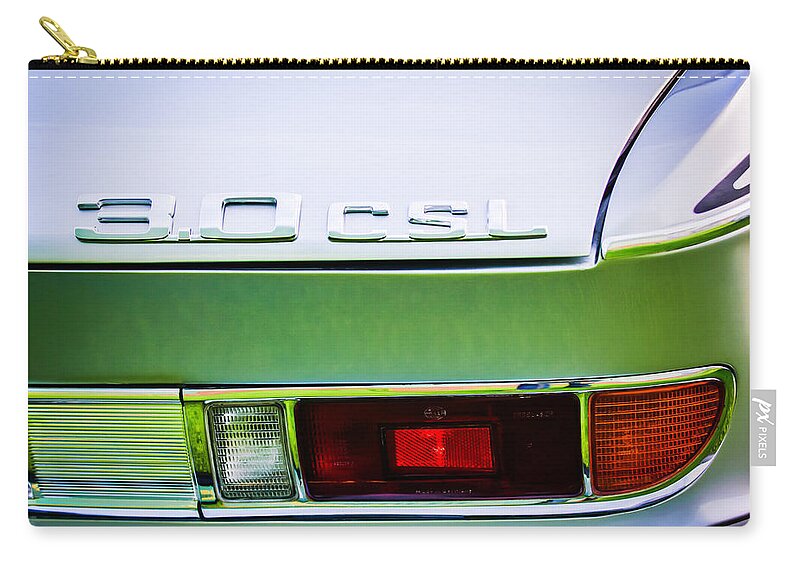 1973 Bmw 3.0 Csl Side Taillight Emblem Zip Pouch featuring the photograph 1973 BMW 3.0 CSL Side Taillight Emblem -1298c by Jill Reger