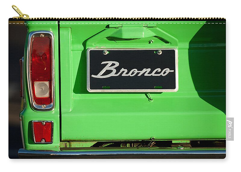 1977 Ford Bronco Taillight Zip Pouch featuring the photograph 1977 Ford Bronco Taillight by Jill Reger