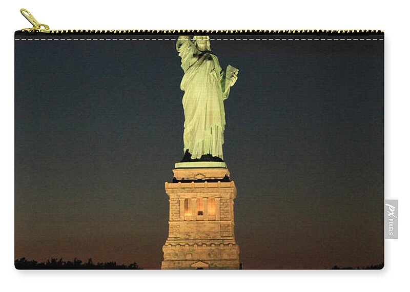 The Statue Of Liberty Zip Pouch featuring the photograph All Lit Up #2 by Catie Canetti