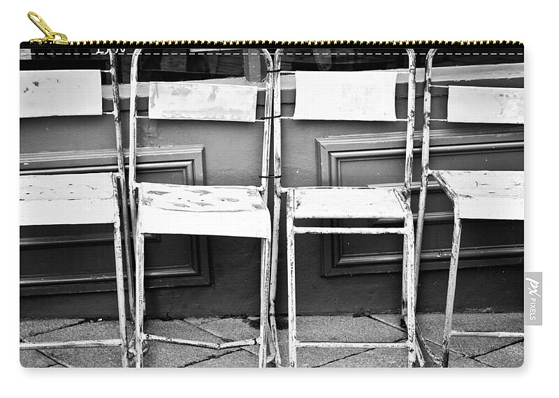 Antique Zip Pouch featuring the photograph Metal chairs #2 by Tom Gowanlock