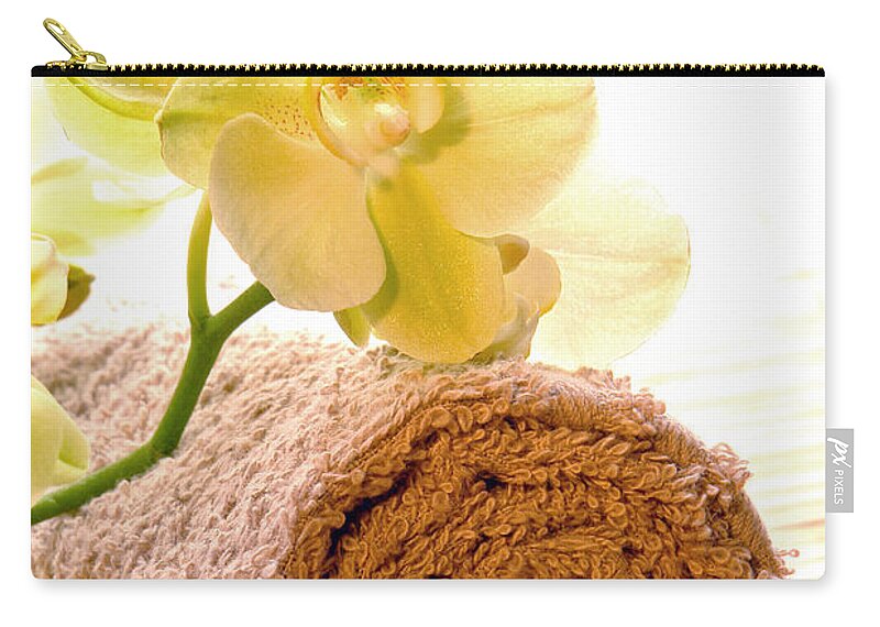 Spa Zip Pouch featuring the photograph Orchid on Towel #2 by Olivier Le Queinec