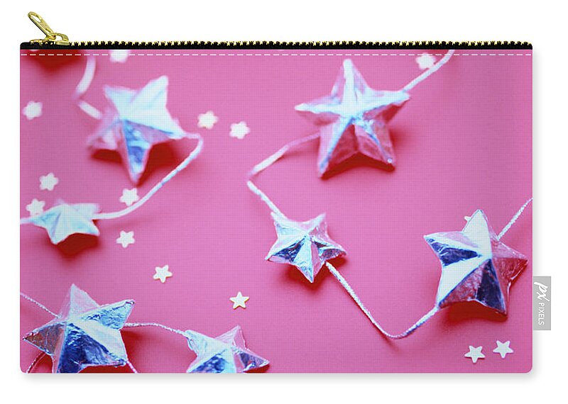 Celebration Zip Pouch featuring the photograph Star Garland #3 by Lawrence Lawry
