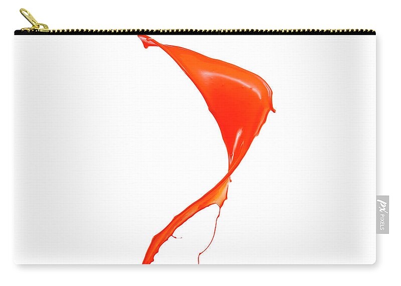 Orange Color Zip Pouch featuring the photograph Splashing Of The Color Paint #4 by Level1studio