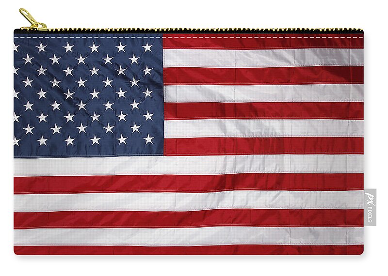 Flag Zip Pouch featuring the photograph American flag No.145 by Les Cunliffe