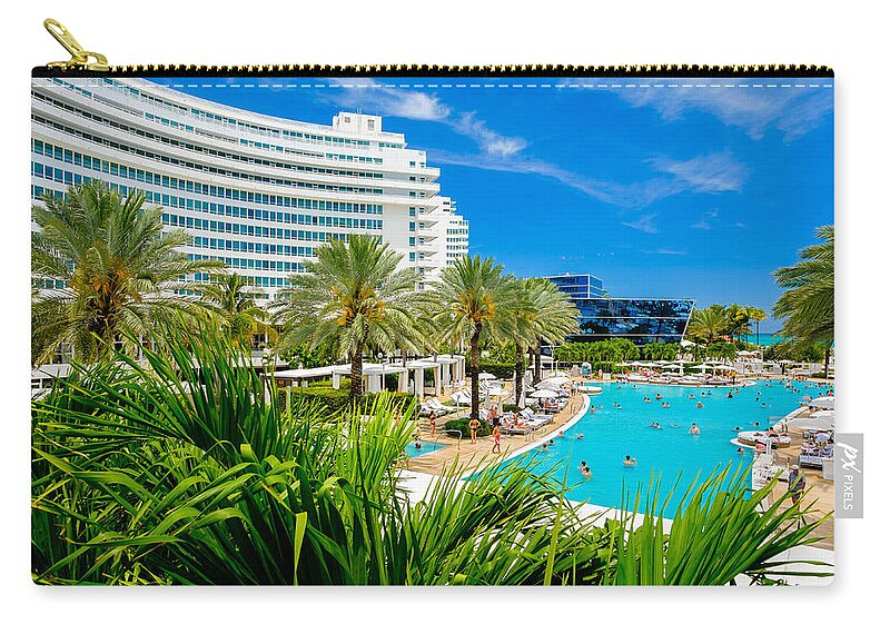 Architecture Carry-all Pouch featuring the photograph Fontainebleau Hotel by Raul Rodriguez