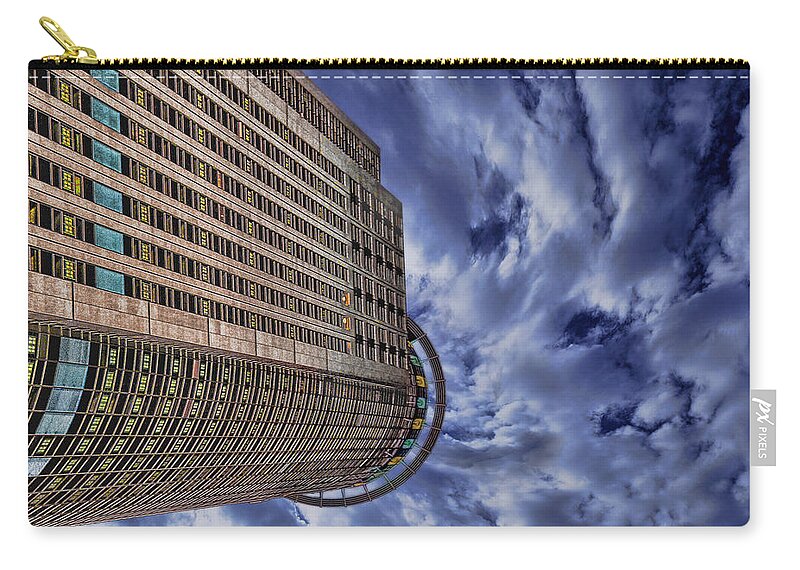 Israel Zip Pouch featuring the photograph A Drifting Skyscraper by Ron Shoshani