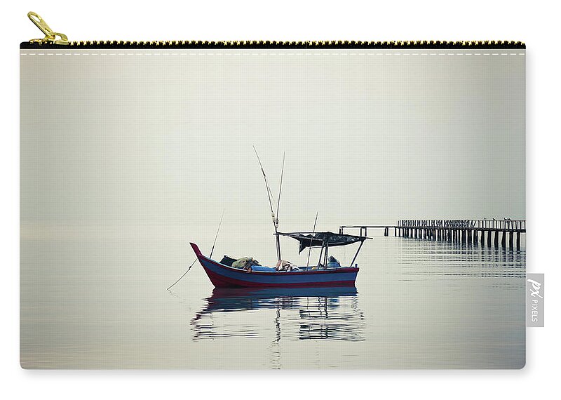 Tranquility Zip Pouch featuring the photograph A Lonely Boat by Ivan Hor