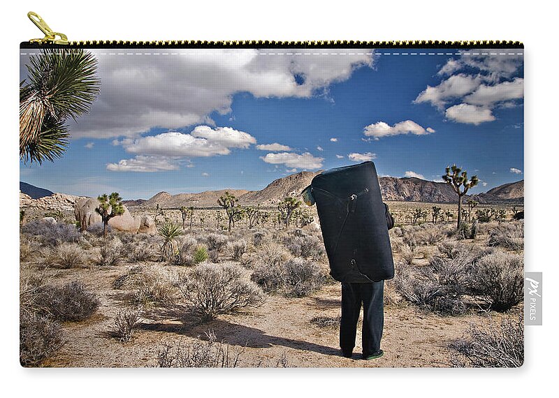 Adult Zip Pouch featuring the photograph A Man Looks Into The Distance by R. Tyler Gross