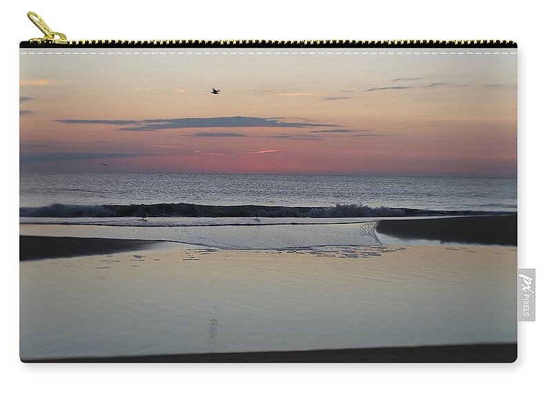 Fauna Zip Pouch featuring the photograph A One Seagull Sunrise by Robert Banach