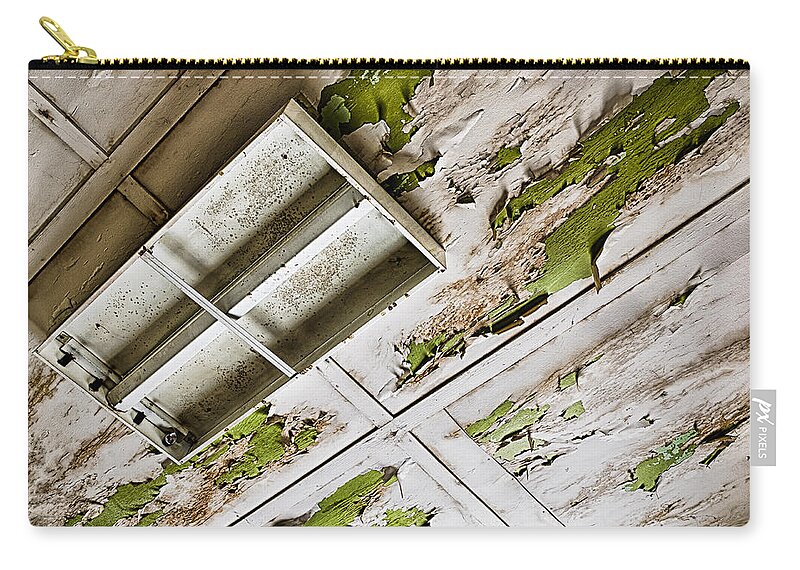 Abandoned Zip Pouch featuring the photograph A Peeling Ceiling by Caitlyn Grasso