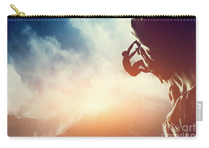Climb Zip Pouch featuring the photograph A silhouette of man climbing on rock mountain by Michal Bednarek