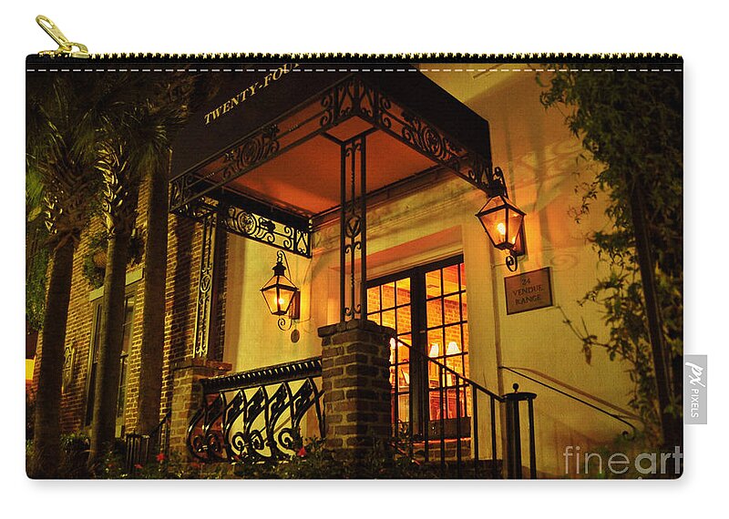 Charleston Zip Pouch featuring the photograph A Warm Summer Night In Charleston by Kathy Baccari