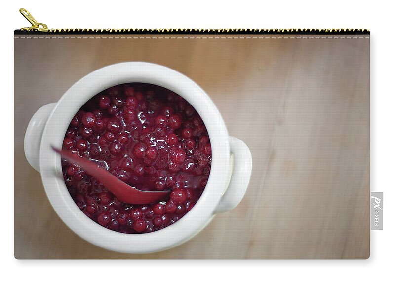 Chutney Zip Pouch featuring the photograph A White Pottery Bowl, Full Of Fresh by Mint Images - Britt Chudleigh