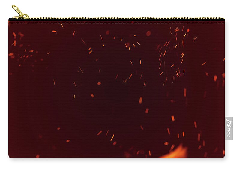 Particle Zip Pouch featuring the photograph Abstract Fire Sparks Background by Sankai