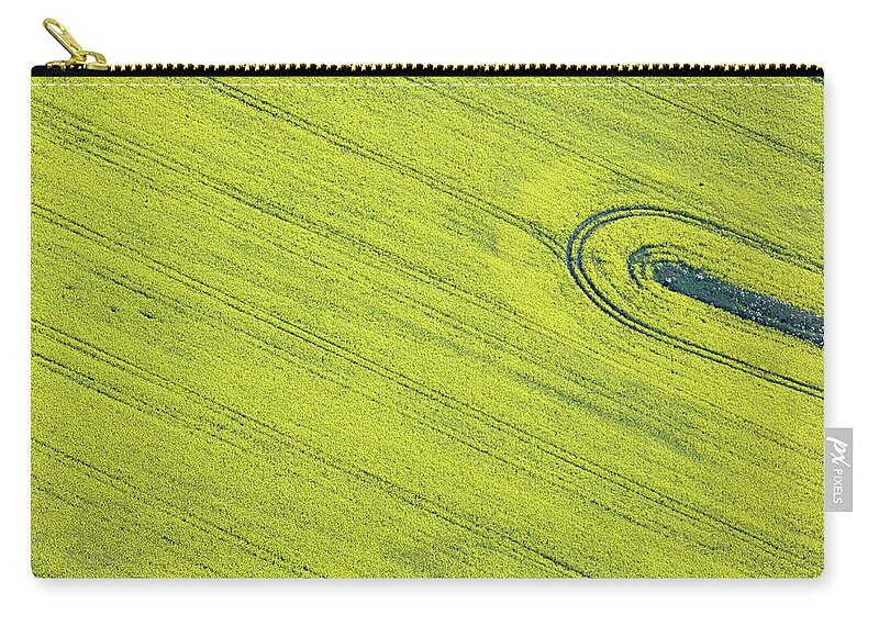 Tranquility Zip Pouch featuring the photograph Aerial View Of Oil Seed Rape Field by Allan Baxter