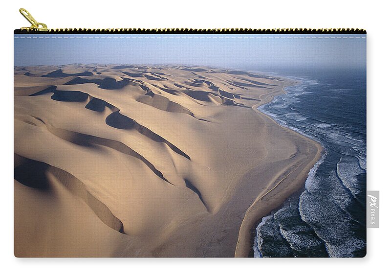 00511477 Zip Pouch featuring the photograph Aerial View Of Sand Dunes by Michael and Patricia Fogden