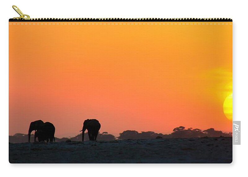Elephants Zip Pouch featuring the photograph African Elephant Sunset by Amanda Stadther