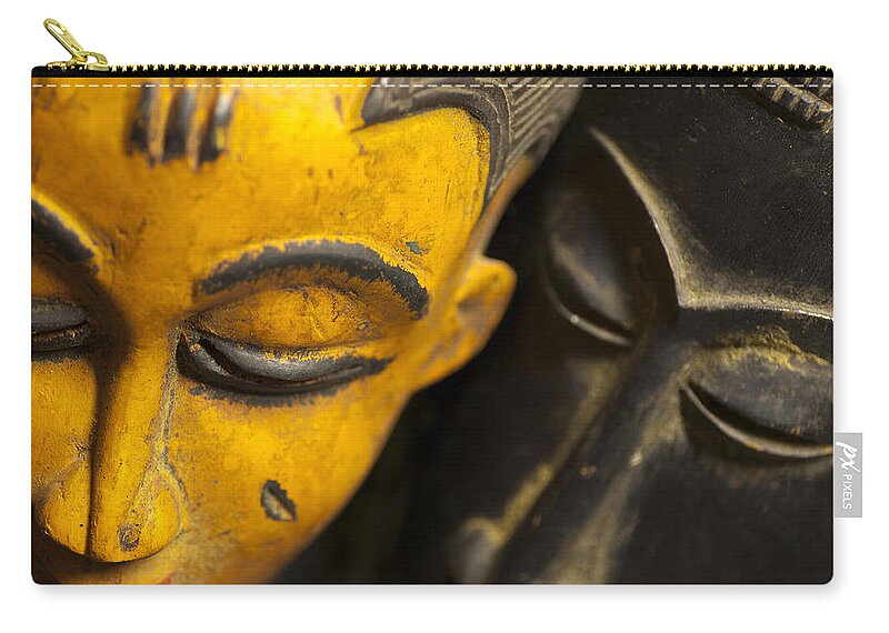 Abstract Carry-all Pouch featuring the photograph African Masks by Raul Rodriguez