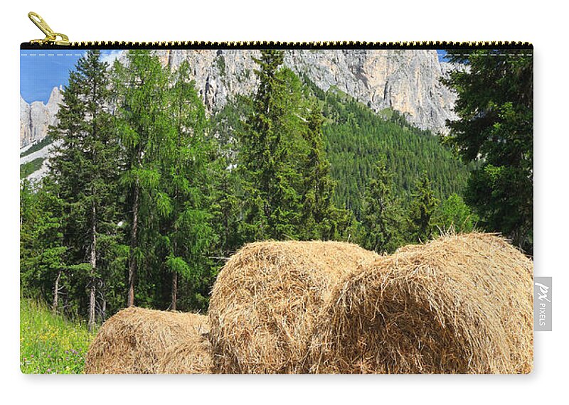 Alps Zip Pouch featuring the photograph alpine pasture in Dolomites by Antonio Scarpi