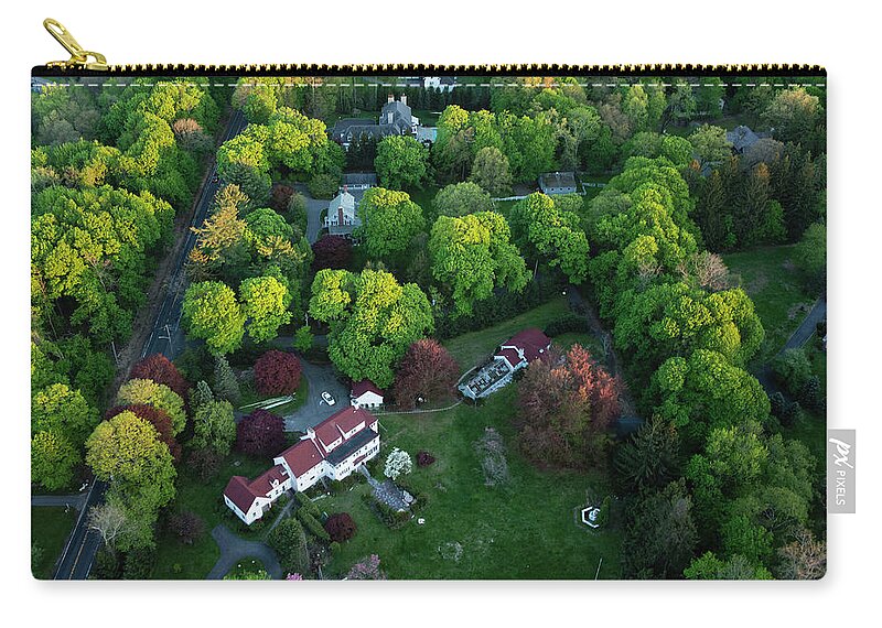 Tranquility Zip Pouch featuring the photograph An Aerial View Of Suburbian Luxury by Michael H