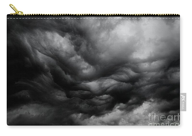 Storm Zip Pouch featuring the photograph An Angry Sky in Black and White by John Harmon