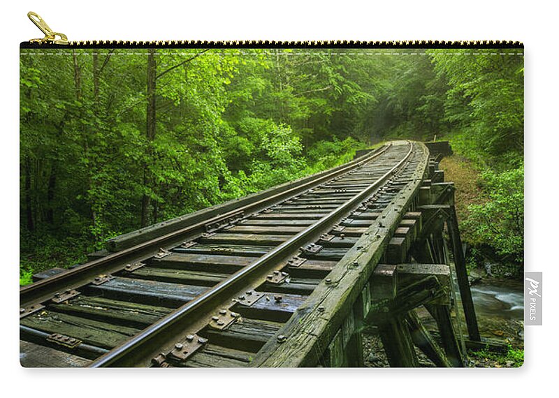 Andrews Zip Pouch featuring the photograph Around the Bend by Debra and Dave Vanderlaan