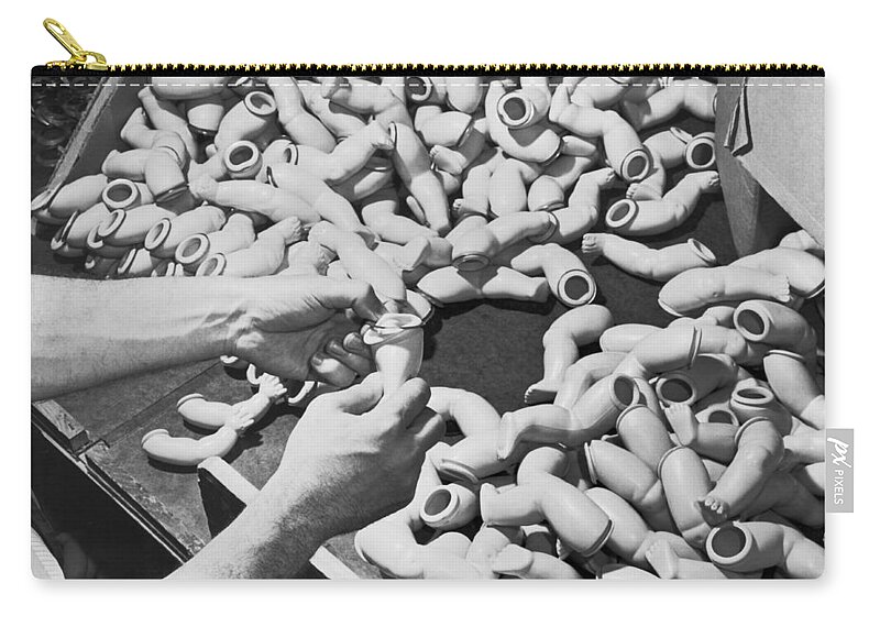1 Person Zip Pouch featuring the photograph Assembling Dolls by Underwood Archives