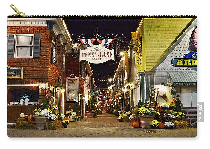 Penny Lane Zip Pouch featuring the photograph Autumn in Penny Lane - Rehoboth Beach Delaware by Kim Bemis