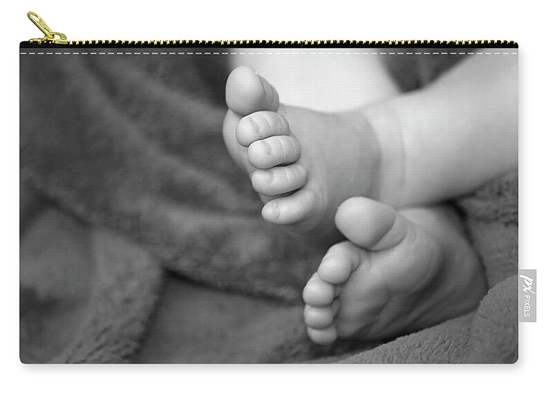 Feet Zip Pouch featuring the photograph Baby Feet by Carolyn Marshall