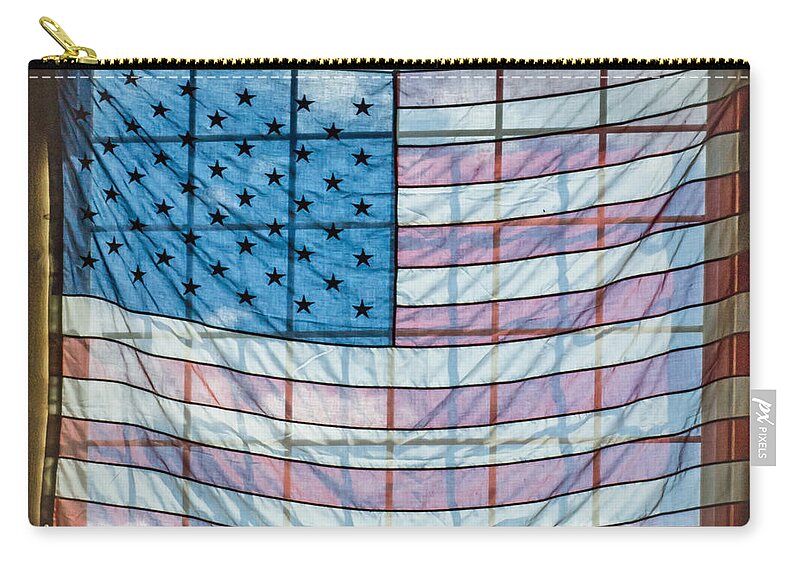 American Flag Zip Pouch featuring the photograph Backlit American Flag by Photographic Arts And Design Studio