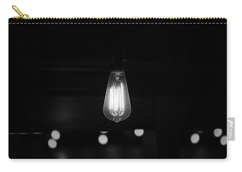 Bare Bulb Zip Pouch featuring the photograph Bare Bulb by Allan Morrison