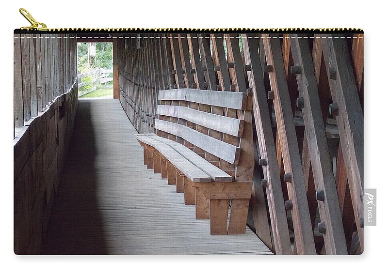 Covered Bridges Zip Pouch featuring the photograph Bench Inside a Covered Bridge by Catherine Gagne