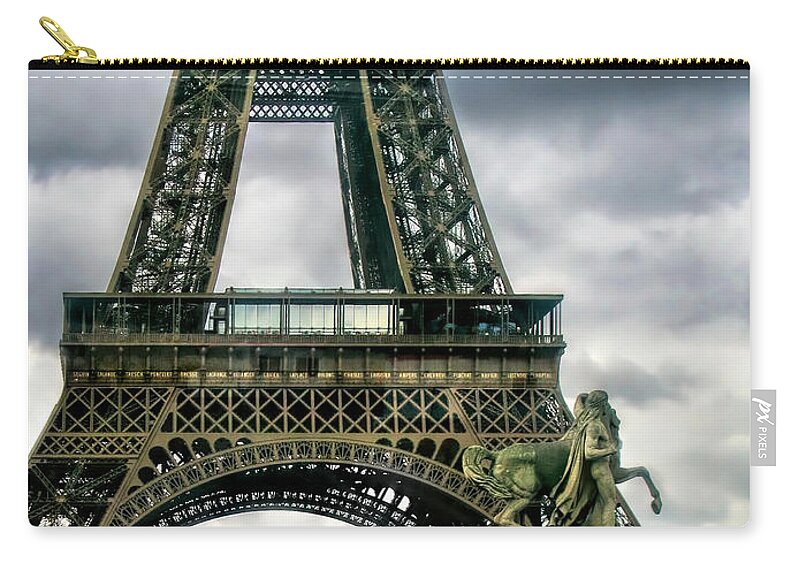 Paris Zip Pouch featuring the photograph Beneath the Eiffel Tower by Jennie Breeze