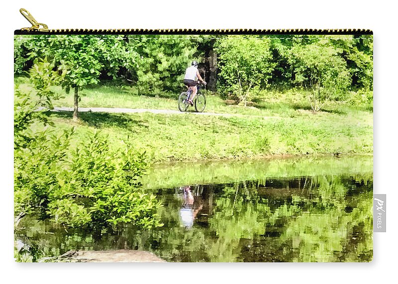 Bicycle Zip Pouch featuring the photograph Bicycling by the Lake by Susan Savad