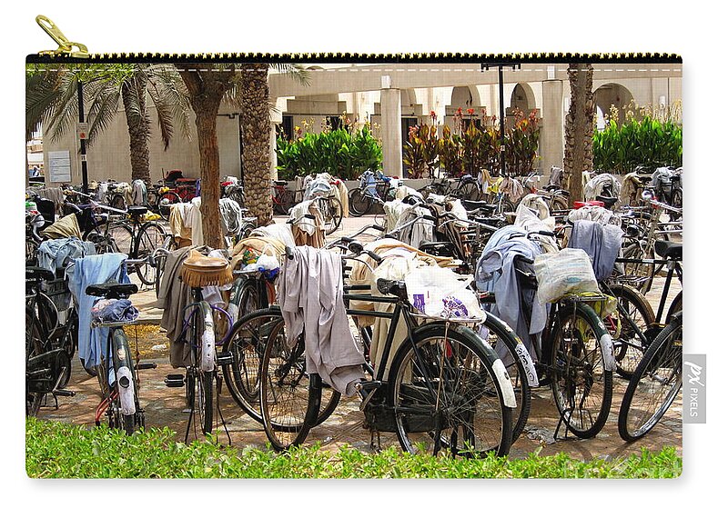 Bikes Zip Pouch featuring the photograph Bikes waiting for their owners by Amanda Mohler