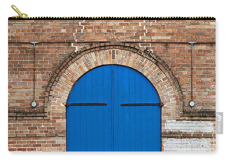 New Orleans Zip Pouch featuring the photograph Blue Door and Brick by Jarrod Erbe