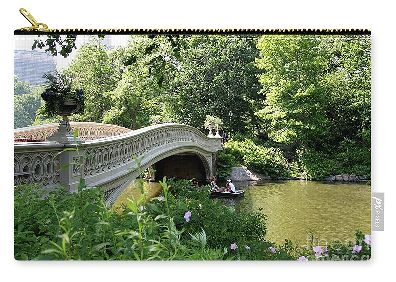 Bow Bridge Zip Pouch featuring the photograph Bow Bridge And Rowboat NYC by Christiane Schulze Art And Photography