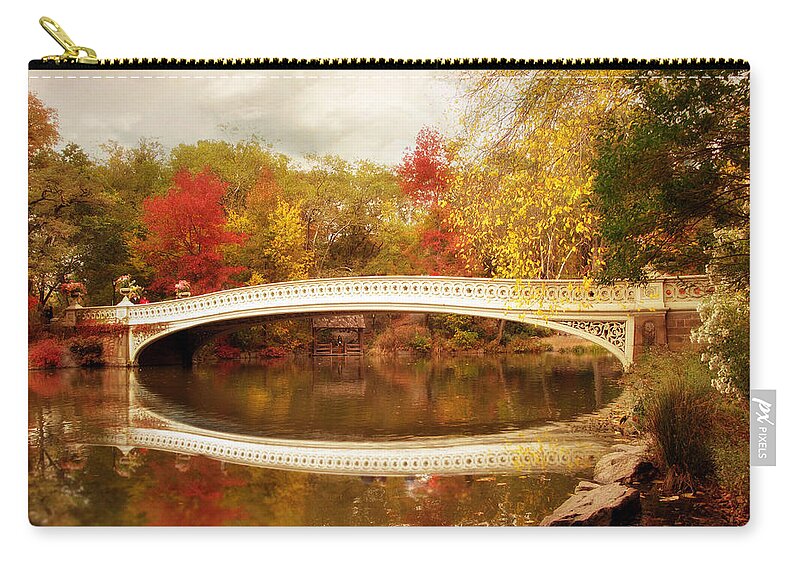 Bow Bridge Zip Pouch featuring the photograph Bow Bridge Reflected by Jessica Jenney