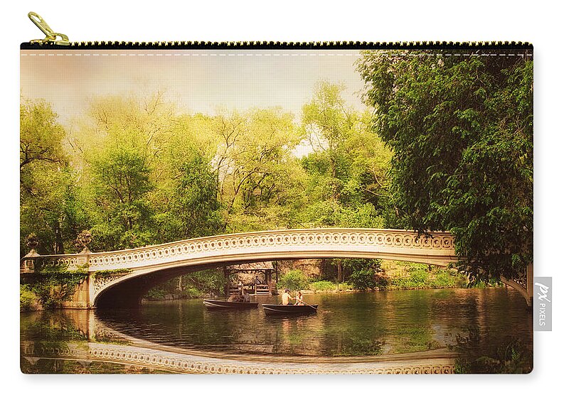 Bow Bridge Zip Pouch featuring the photograph Bow Bridge Rowers by Jessica Jenney